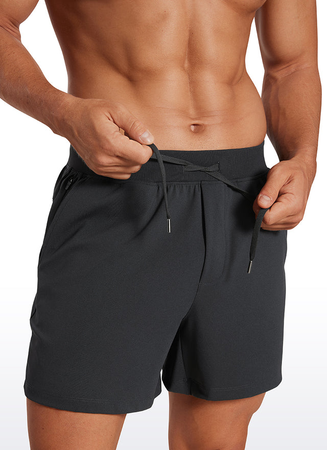 CRZ YOGA Men's Train Relaxed Fit On the Travel Linerless Shorts 5'' Ink Gray