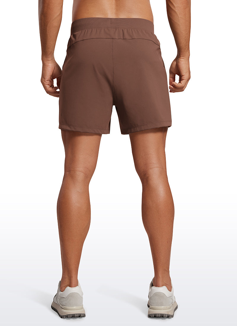 CRZ YOGA Men's Train Relaxed Fit On the Travel Linerless Shorts 5'' Coffee Brown