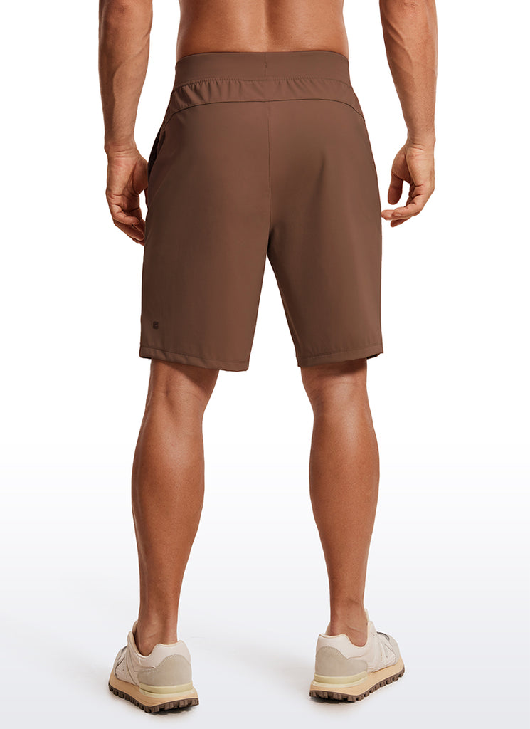 CRZ YOGA Men's Train Relaxed Fit On the Travel Linerless Shorts 9'' Dark Brown