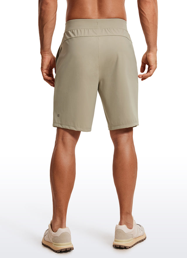 CRZ YOGA Men's Train Relaxed Fit On the Travel Linerless Shorts 9'' Khali Barley @model_info:ALE