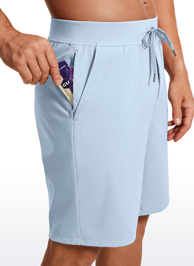 CRZ YOGA Men's Train Relaxed Fit On the Travel Linerless Shorts 9'' Chambray Blue