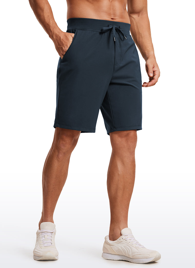 CRZ YOGA Men's Train Relaxed Fit On the Travel Linerless Shorts 9'' True Navy