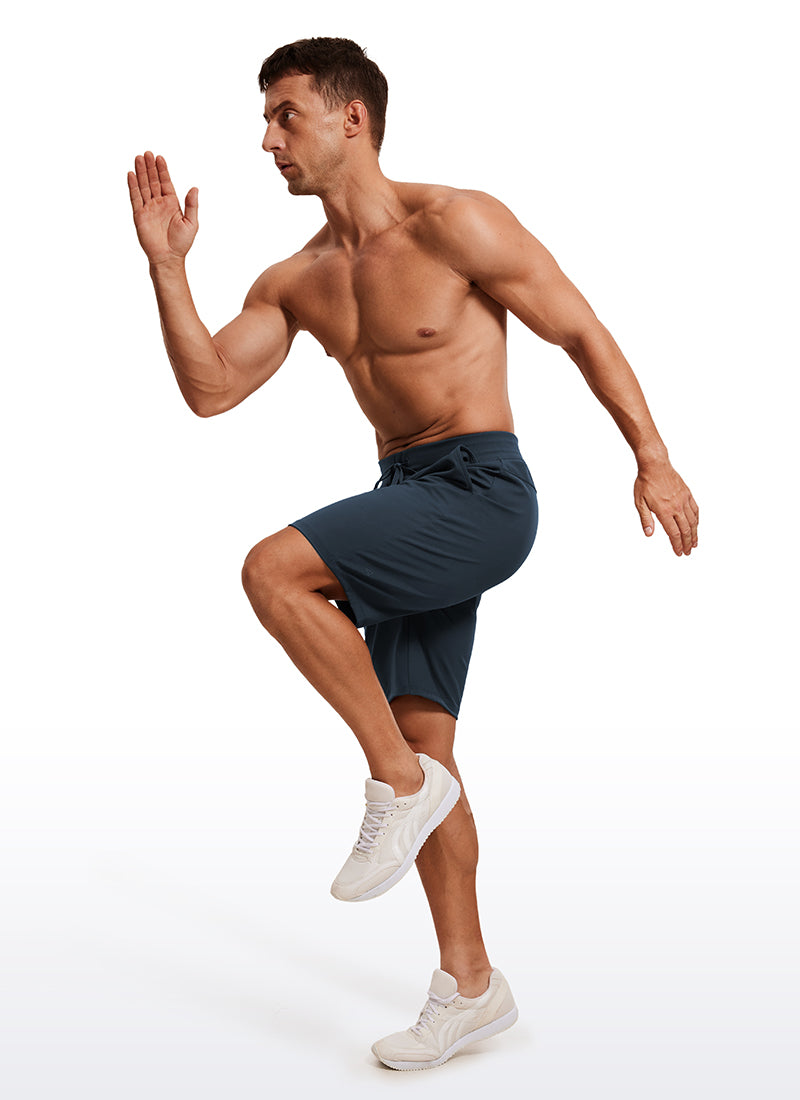 CRZ YOGA Men's Train Relaxed Fit On the Travel Linerless Shorts 9'' True Navy
