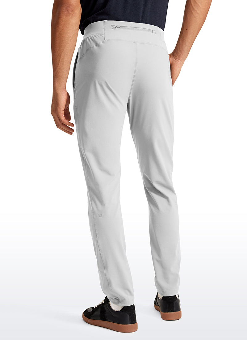 CRZ YOGA Men's Train Relaxed Fit On the Travel Pants 30'' Platinum Grey @model_info:Jhony