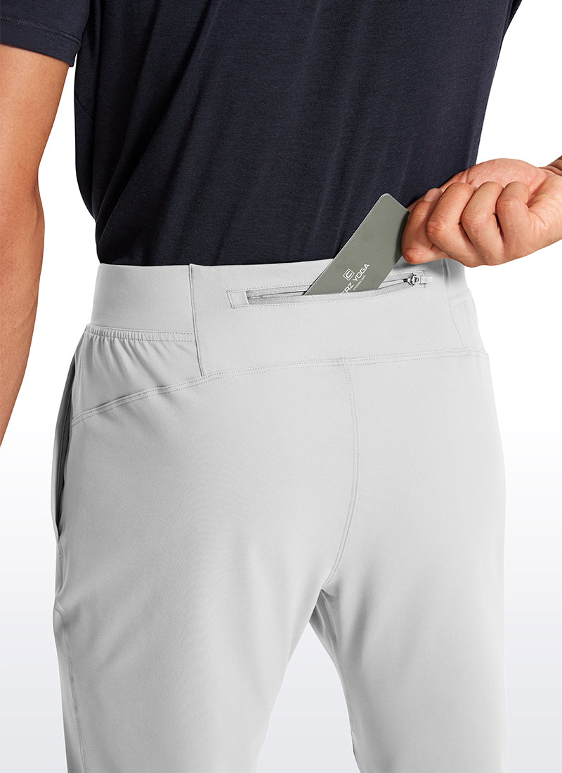 CRZ YOGA Men's Train Relaxed Fit On the Travel Pants 30'' Platinum Grey @model_info:Jhony