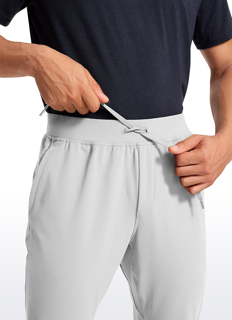 CRZ YOGA Men's Train Relaxed Fit On the Travel Pants 30'' Platinum Grey @model_info:Jhony