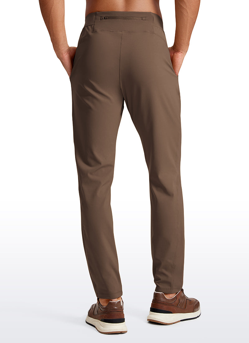 CRZ YOGA Men's Train Relaxed Fit On the Travel Pants 30'' Dark Olive Brown @model_info:Jhony