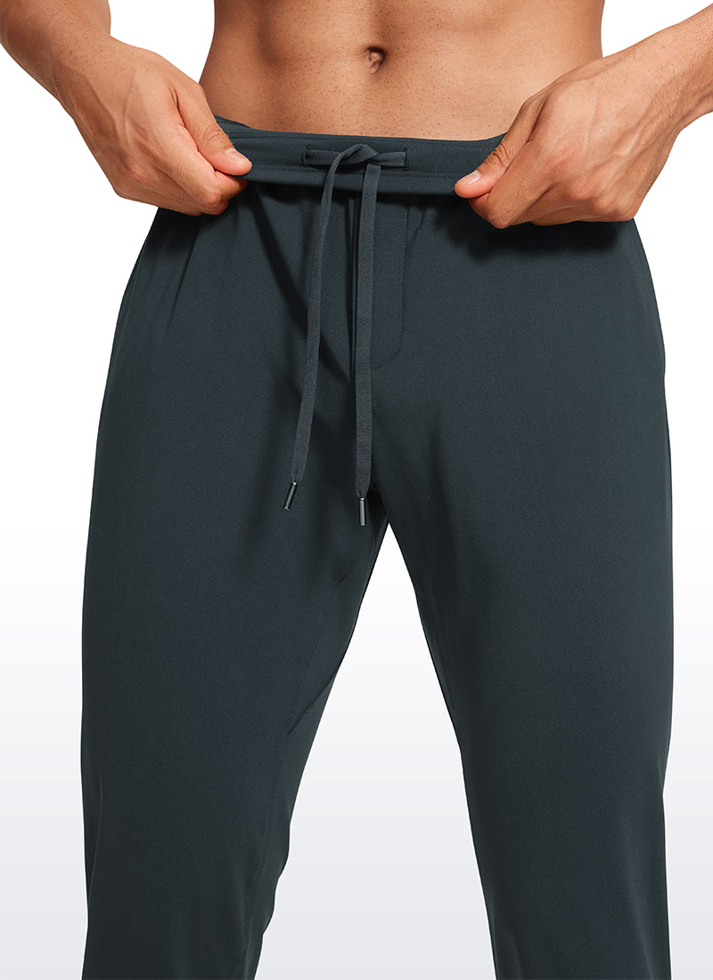 CRZ YOGA Men's Train Relaxed Fit On the Travel Pants 30'' Melanite @model_info:Jhony