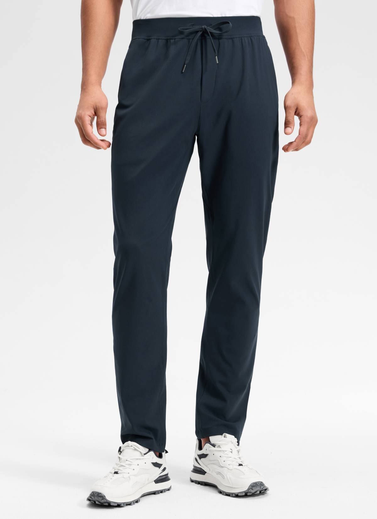 CRZ YOGA Men's Train Relaxed Fit On the Travel Pants 30'' True Navy @model_info:Rafael