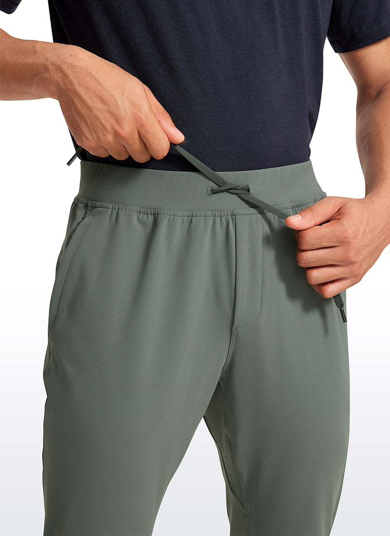 CRZ YOGA Men's Train Relaxed Fit On the Travel Pants 30'' Grey Sage @model_info:Jhony