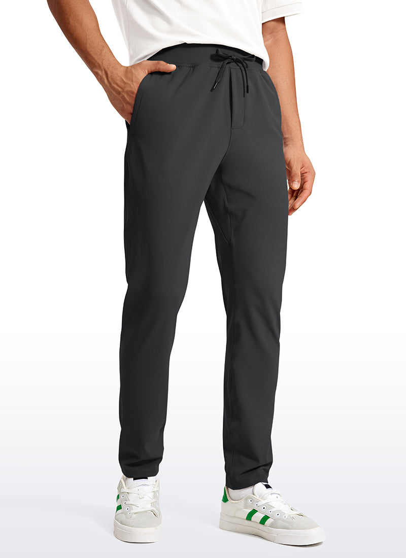 CRZ YOGA Men's Train Relaxed Fit On the Travel Pants 30'' Ink Gray @model_info:Jhony