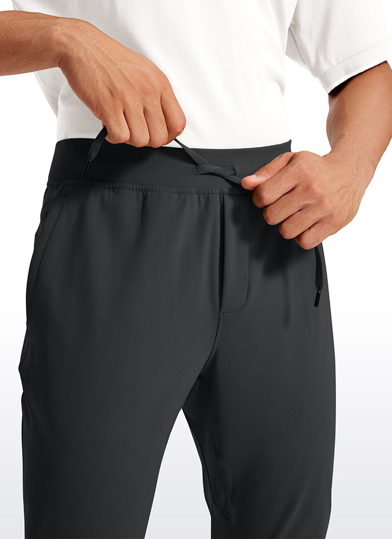 CRZ YOGA Men's Train Relaxed Fit On the Travel Pants 30'' Ink Gray @model_info:Jhony