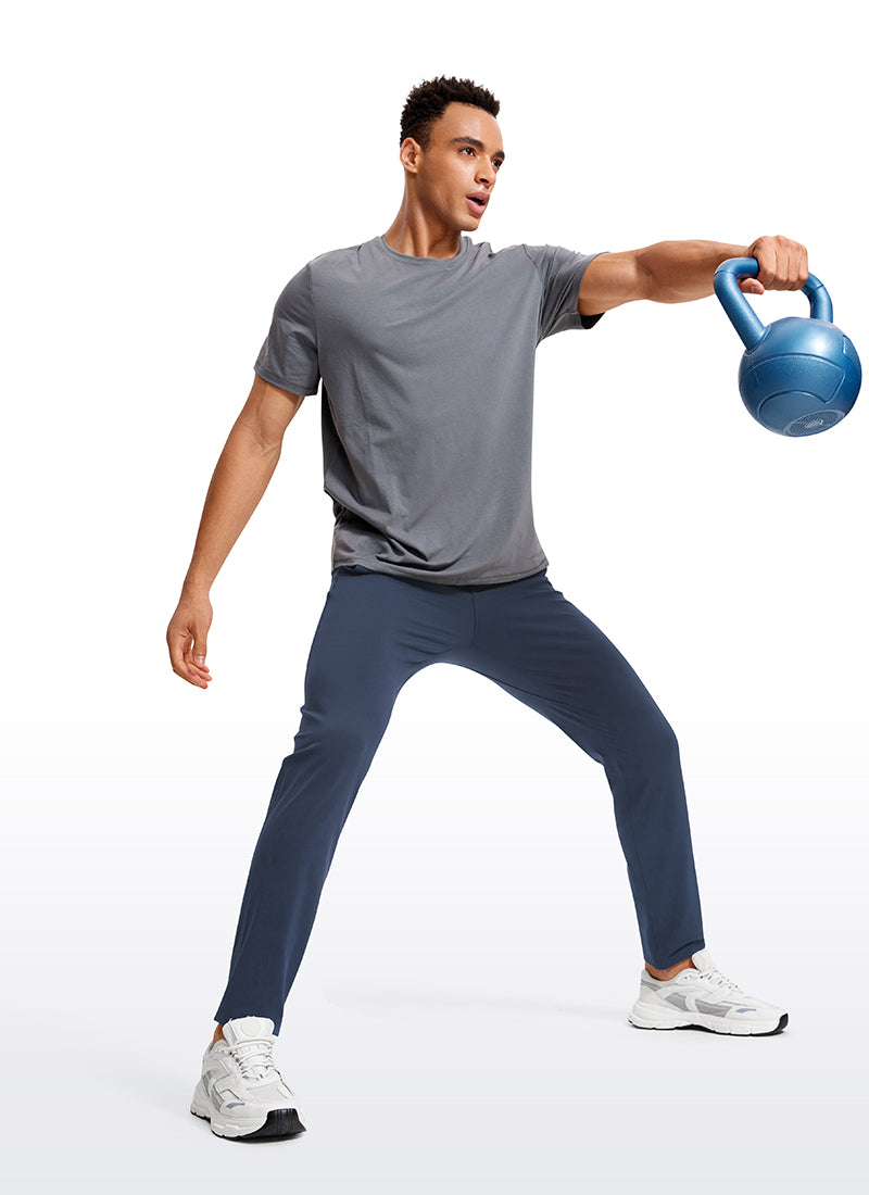 CRZ YOGA Men's Train Relaxed Fit On the Travel Pants 30'' Electric Blue @model_info:Jhony