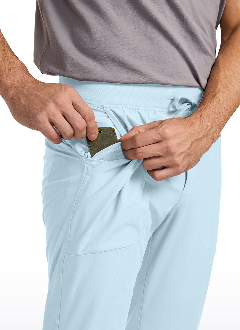 CRZ YOGA Mens Work Slim Fit All-Day Comfort Golf Joggers 30'' Chambray Blue @model_info:IL