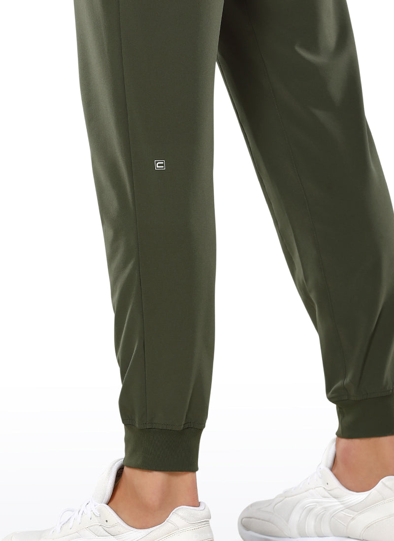 CRZ YOGA Men's Train Classic Fit Lightweight Quick Dry Joggers 29'' Dark Olive