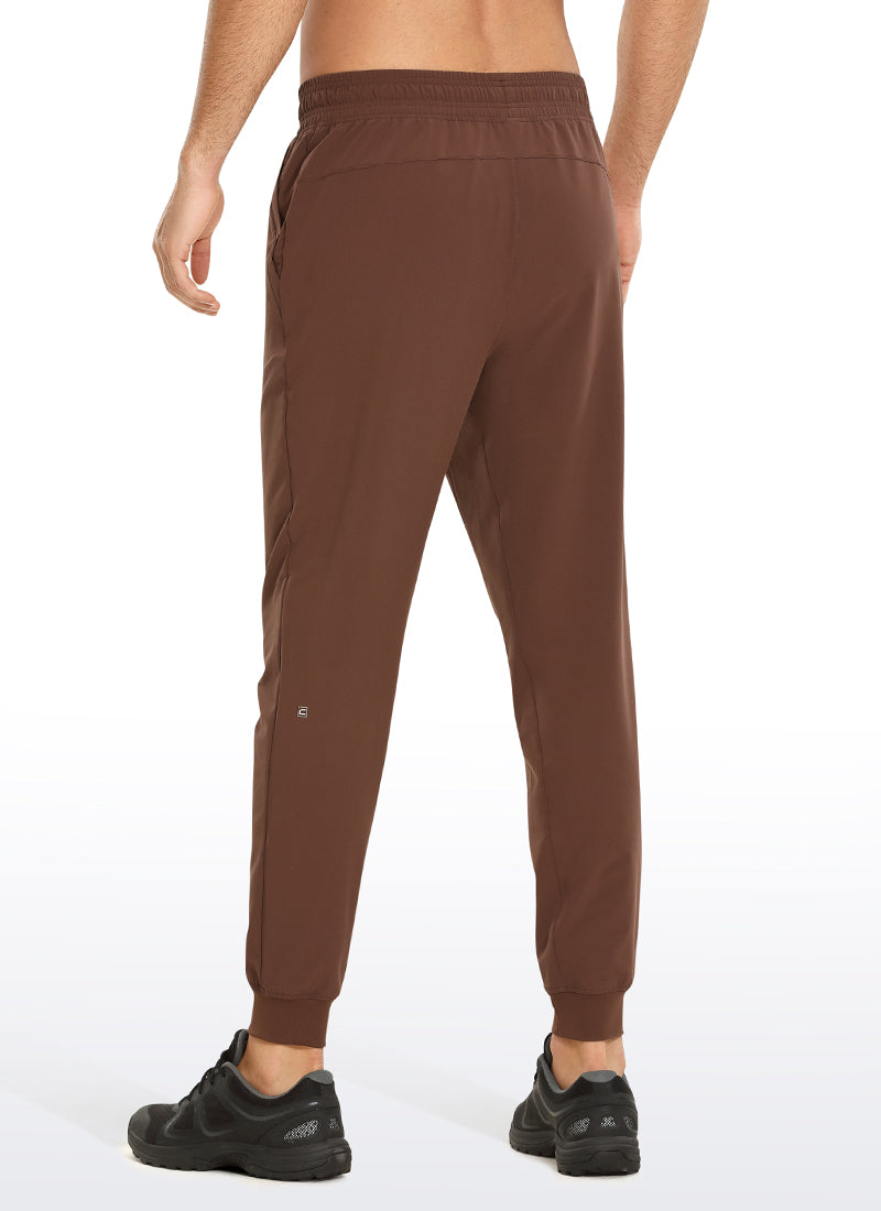 CRZ YOGA Men's Train Classic Fit Lightweight Quick Dry Joggers 29'' Dark Brown