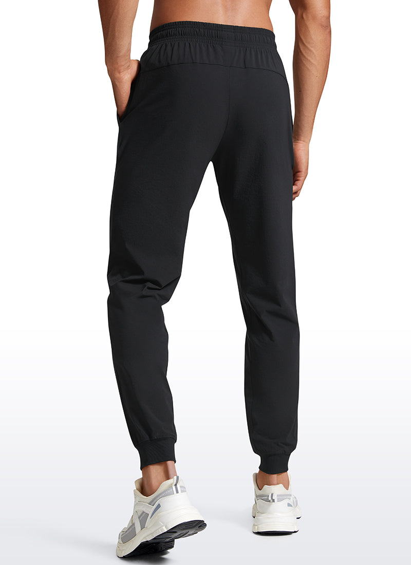 CRZ YOGA Men's Causul Relaxed Fit Lightweight Joggers Zip Pockets 29'' Black @model_info:Jhony