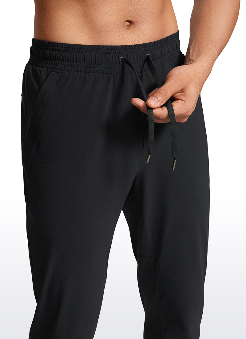 CRZ YOGA Men's Causul Relaxed Fit Lightweight Joggers Zip Pockets 29'' Black @model_info:Jhony