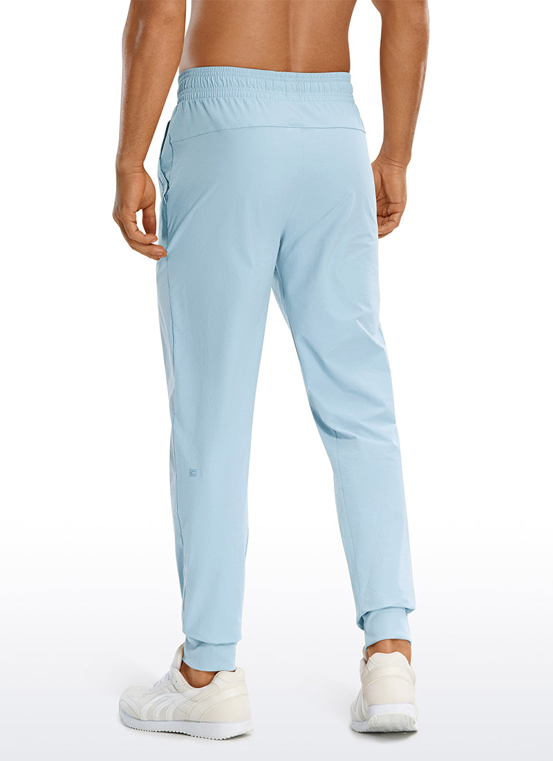 CRZ YOGA Men's Causul Relaxed Fit Lightweight Joggers Zip Pockets 29'' Chambray Blue