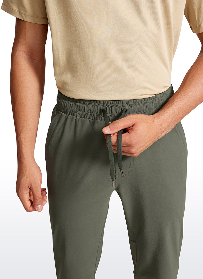 CRZ YOGA Men's Causul Relaxed Fit Lightweight Joggers Zip Pockets 29'' Light Army Green @model_info:Jhony