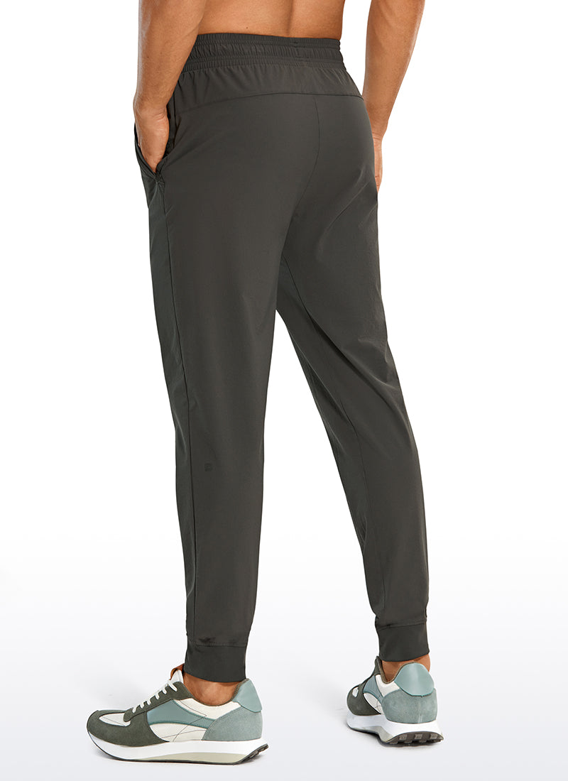 CRZ YOGA Men's Causul Relaxed Fit Lightweight Joggers Zip Pockets 29'' Arbor Olive @model_info:A