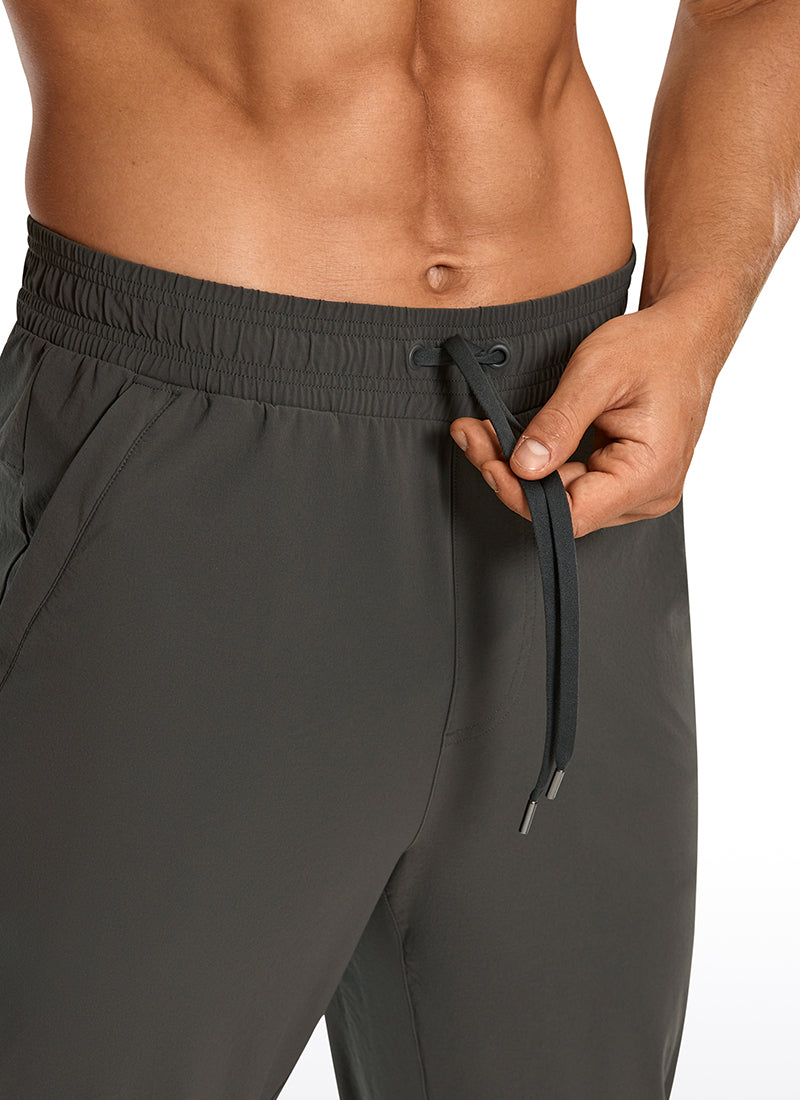 CRZ YOGA Men's Causul Relaxed Fit Lightweight Joggers Zip Pockets 29'' Arbor Olive @model_info:A