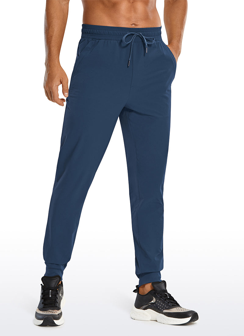 CRZ YOGA Men's Causul Relaxed Fit Lightweight Joggers Zip Pockets 29'' Electric Blue @model_info:ALE