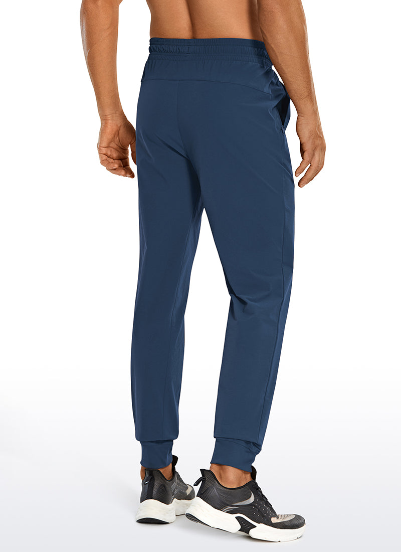 CRZ YOGA Men's Causul Relaxed Fit Lightweight Joggers Zip Pockets 29'' Electric Blue @model_info:ALE