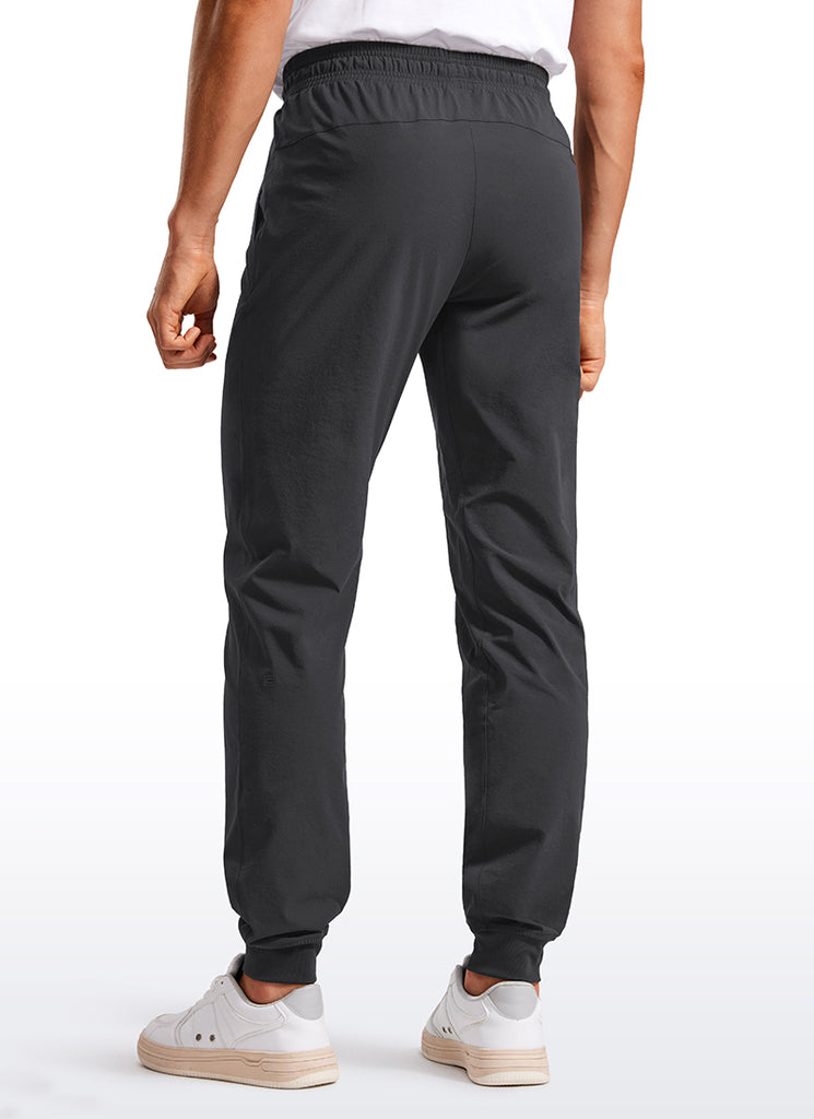 CRZ YOGA Men 31" Lightweight Water Resistant with Zip Pockets Joggers Black