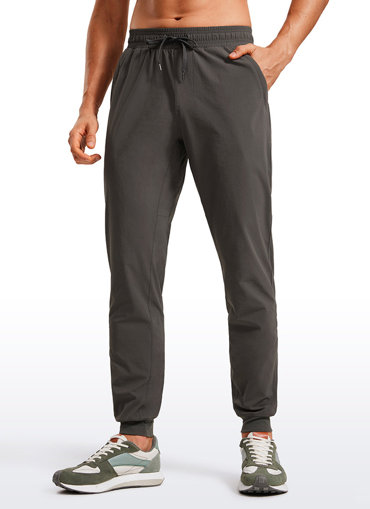 CRZ YOGA Men 31" Lightweight Water Resistant with Zip Pockets Joggers Arbor Olive