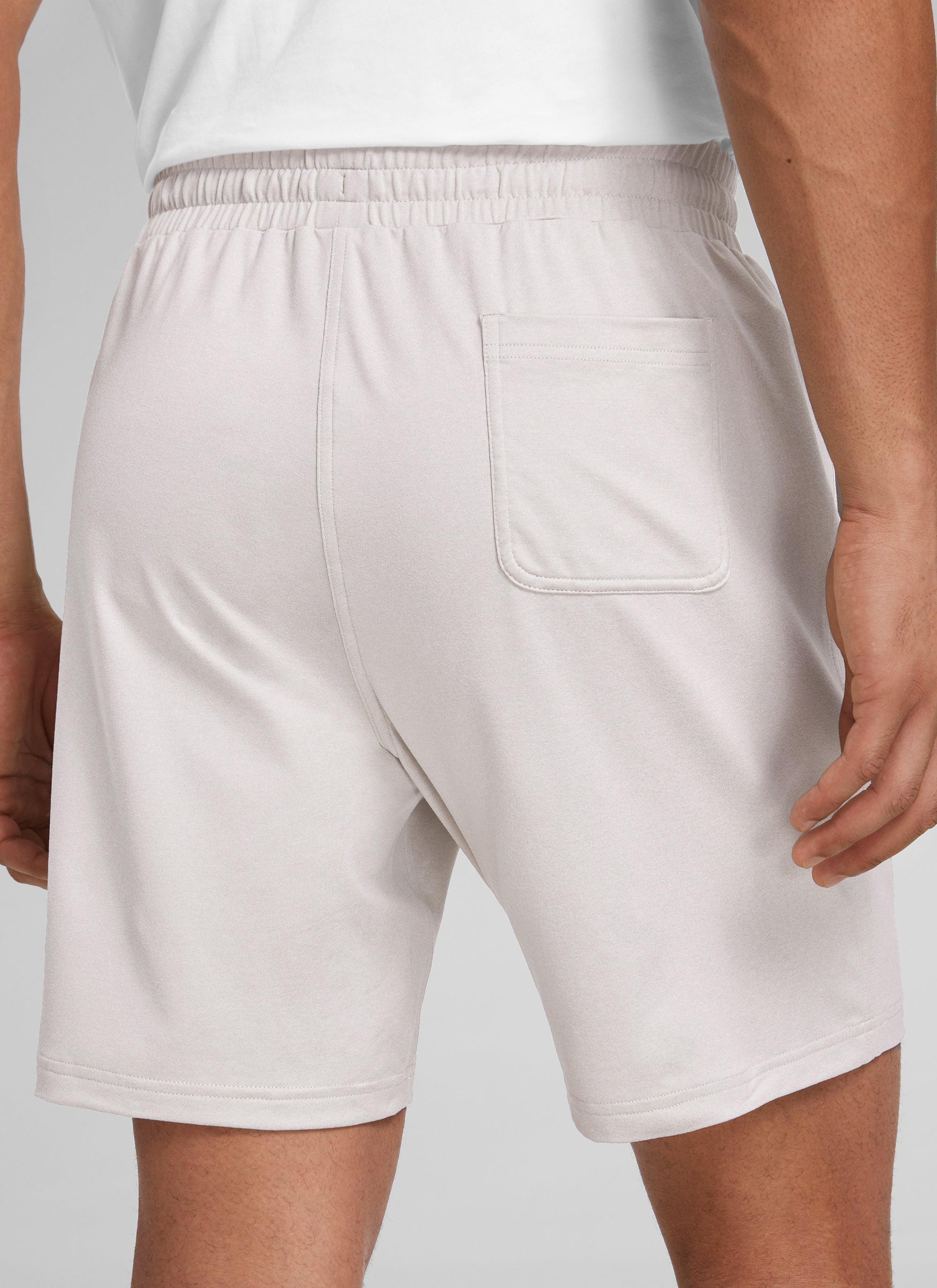 CRZ YOGA Men's Casual Lightweight Sweat Shorts with Pockets Milky White @model_info:J