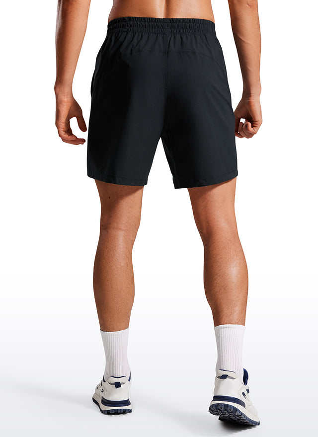 CRZ YOGA Men's Training Quick Dry Pocketed Linerless Shorts 7'' Black @model_info:Maxim