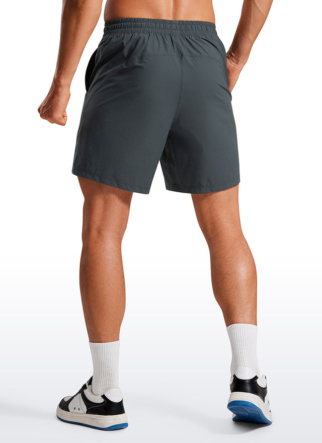 CRZ YOGA Men's Training Quick Dry Pocketed Linerless Shorts 7'' Melanite @model_info:Maxim