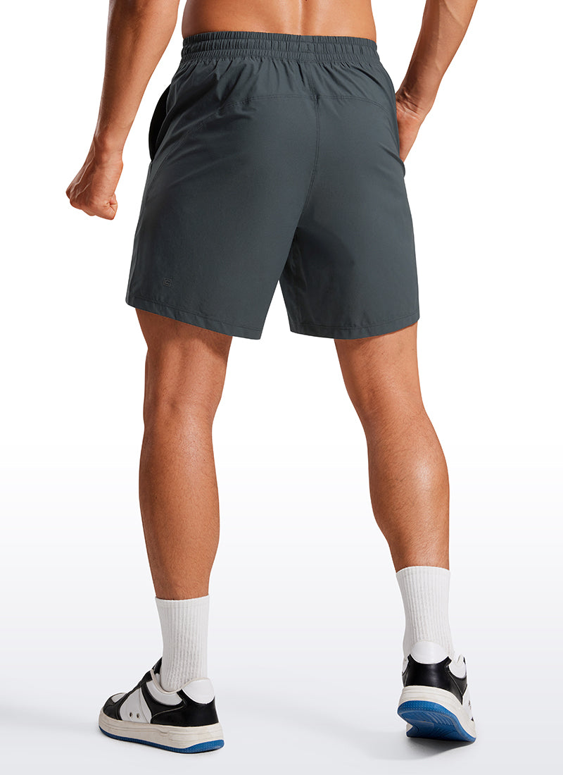 CRZ YOGA Men's Training Quick Dry Pocketed Linerless Shorts 7'' Melanite