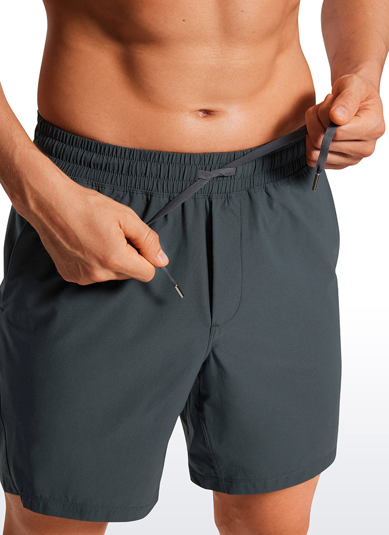 CRZ YOGA Men's Training Quick Dry Pocketed Linerless Shorts 7'' Melanite