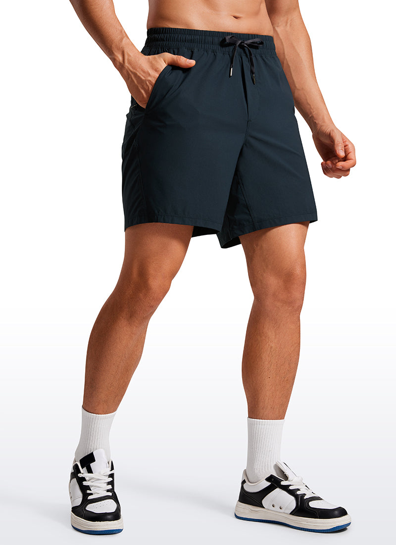 CRZ YOGA Men's Training Quick Dry Pocketed Linerless Shorts 7'' True Navy