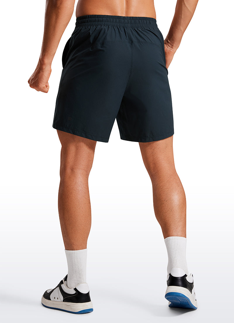 CRZ YOGA Men's Training Quick Dry Pocketed Linerless Shorts 7'' True Navy