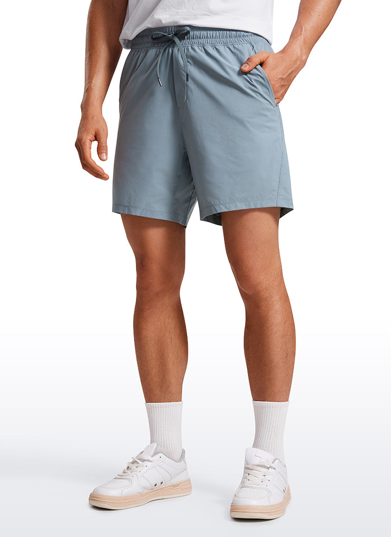 CRZ YOGA Men's Training Quick Dry Pocketed Linerless Shorts 7'' Belgian Blue