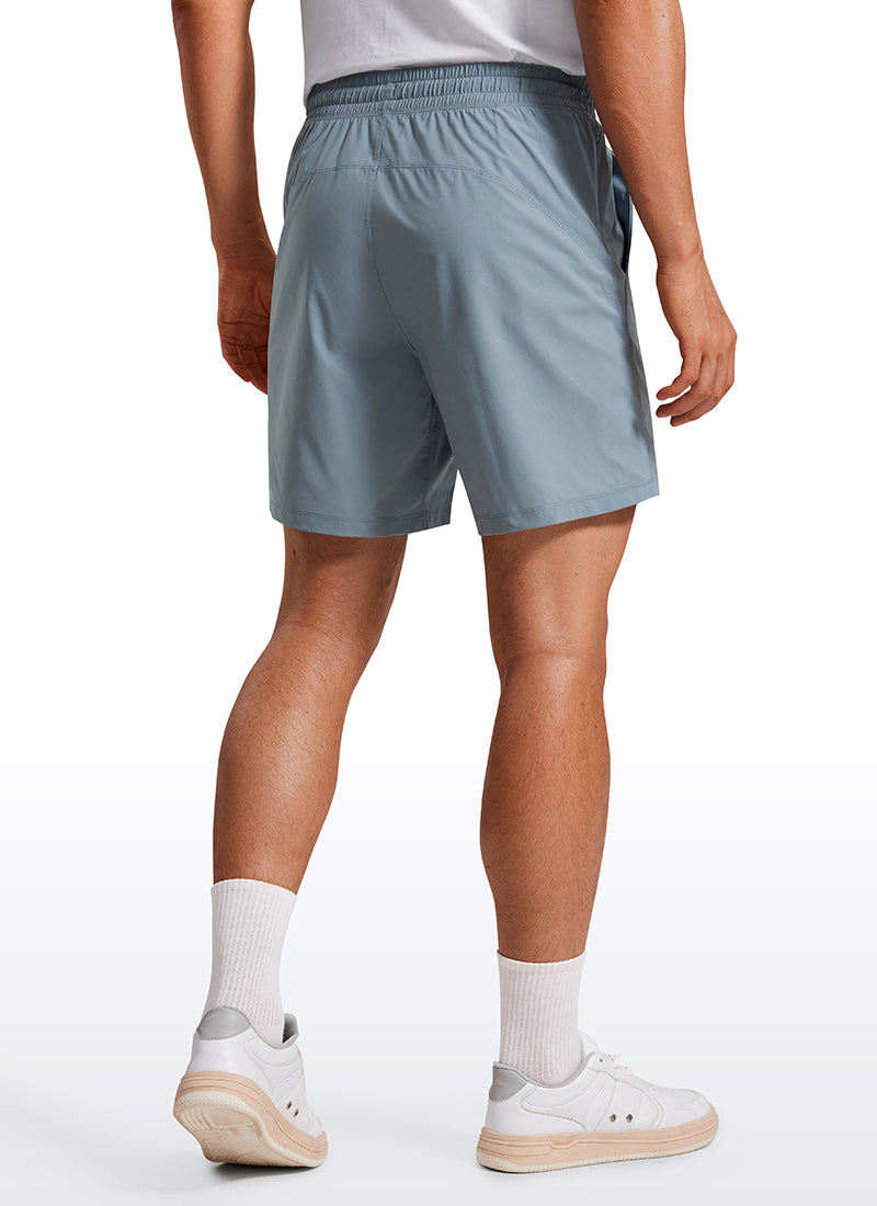 CRZ YOGA Men's Training Quick Dry Pocketed Linerless Shorts 7'' Belgian Blue @model_info:Maxim