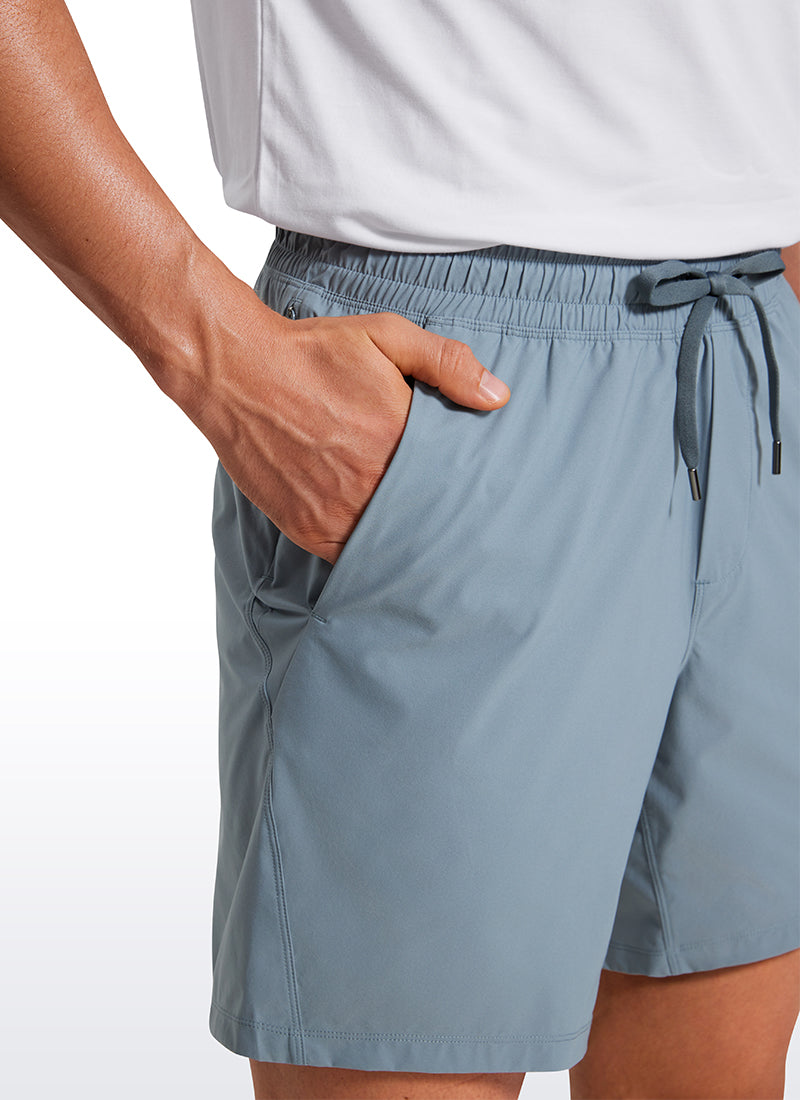 CRZ YOGA Men's Training Quick Dry Pocketed Linerless Shorts 7'' Belgian Blue @model_info:Maxim