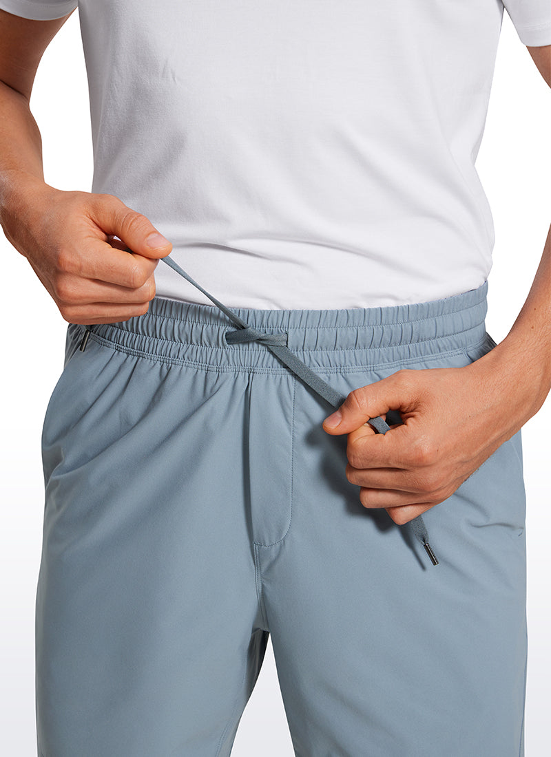 CRZ YOGA Men's Training Quick Dry Pocketed Linerless Shorts 7'' Belgian Blue @model_info:Maxim