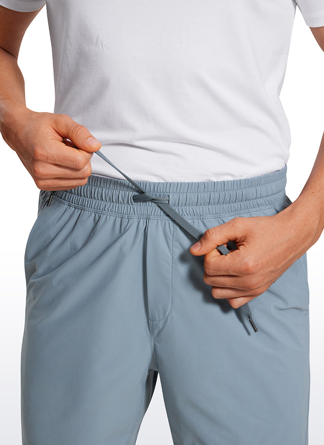 CRZ YOGA Men's Training Quick Dry Pocketed Linerless Shorts 7'' Belgian Blue @model_info:Maxim