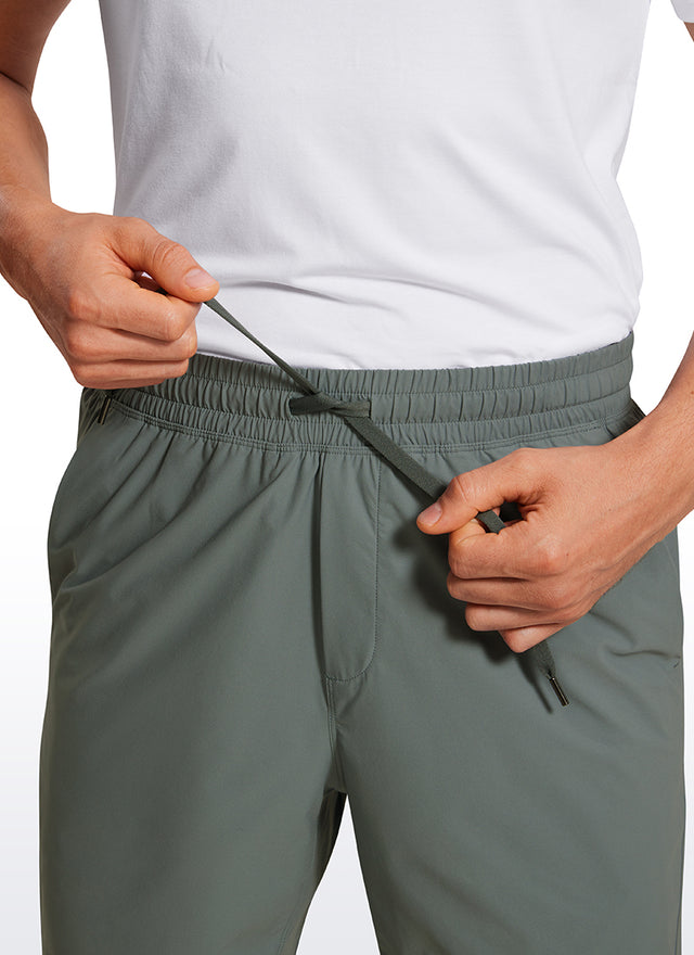 CRZ YOGA Men's Training Quick Dry Pocketed Linerless Shorts 7'' Grey Sage