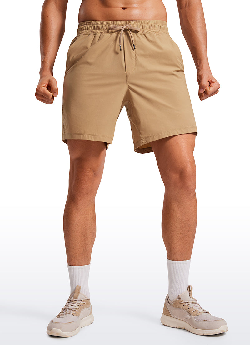 CRZ YOGA Men's Training Quick Dry Pocketed Linerless Shorts 7'' Khaki Sand