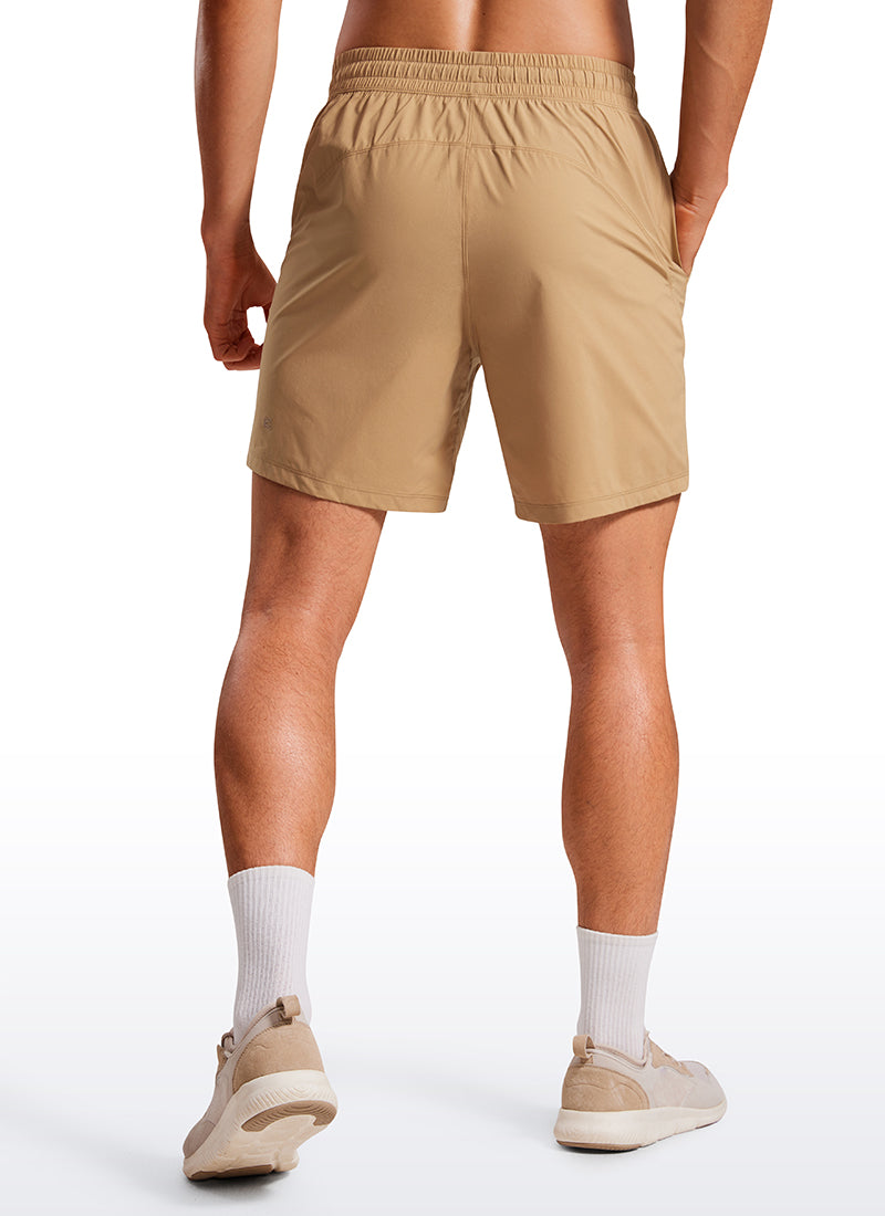 CRZ YOGA Men's Training Quick Dry Pocketed Linerless Shorts 7'' Khaki Sand