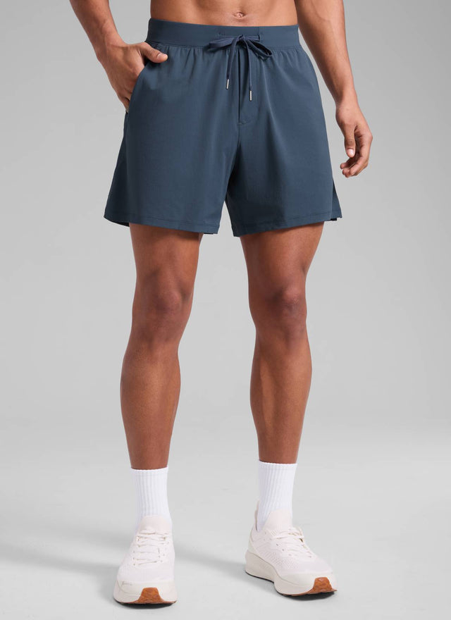 CRZ YOGA Men's Quick Dry Lightweight Gym Shorts with Zipper Pocket Stelindigo