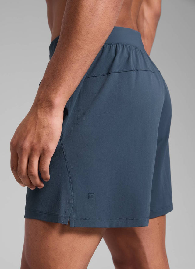 CRZ YOGA Men's Quick Dry Lightweight Gym Shorts with Zipper Pocket Stelindigo
