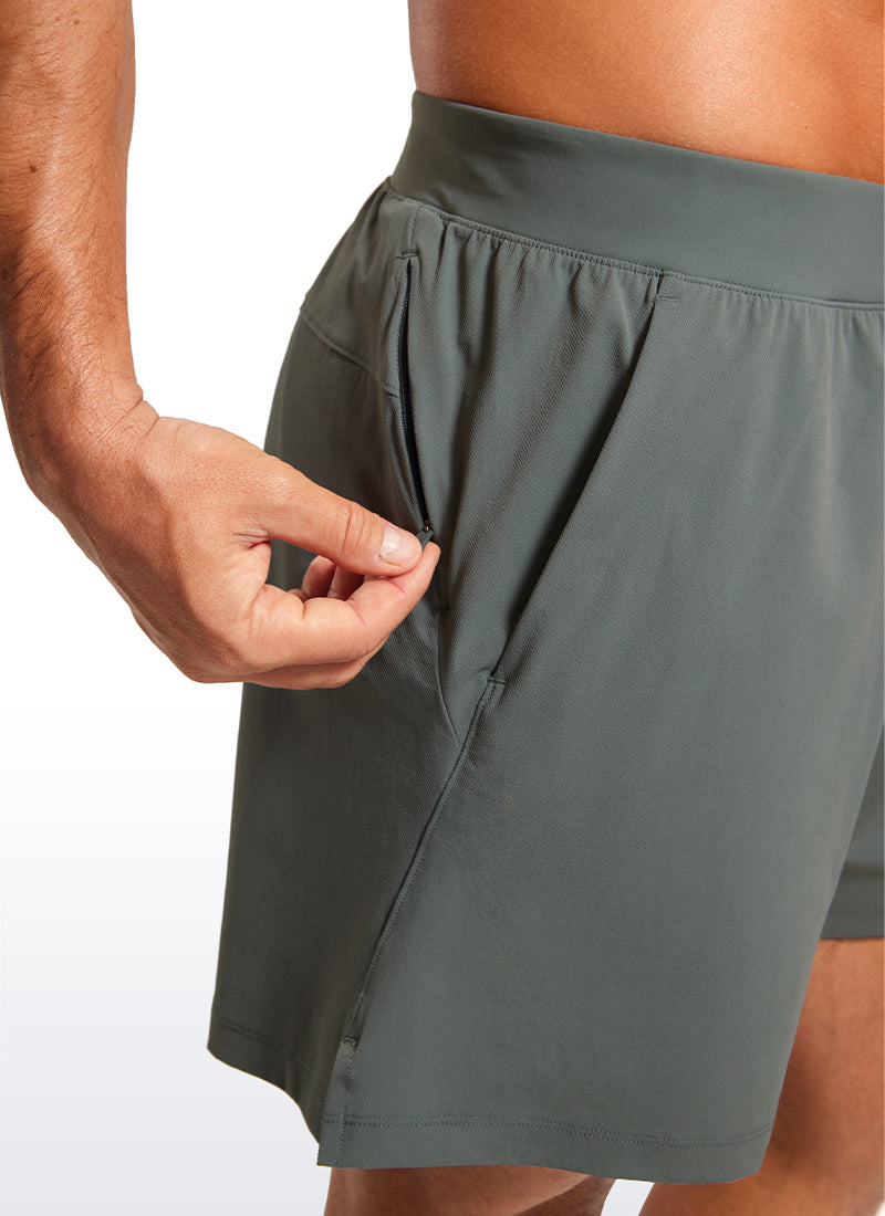 CRZ YOGA Men's Quick Dry Lightweight Gym Shorts with Zipper Pocket Grey Sage @model_info:A