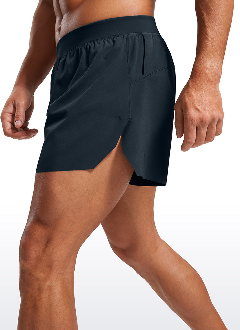 CRZ YOGA Men's 2 in 1 Running Dolphin Quick Dry Zip Pocket Shorts  4'' True Navy @model_info:M