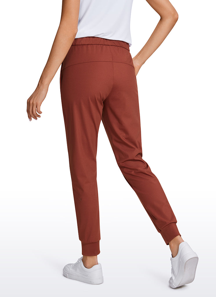 CRZ YOGA Women's Travel Slim Fit Stretch Drawstring Jogger 27'' The Cognac Brown